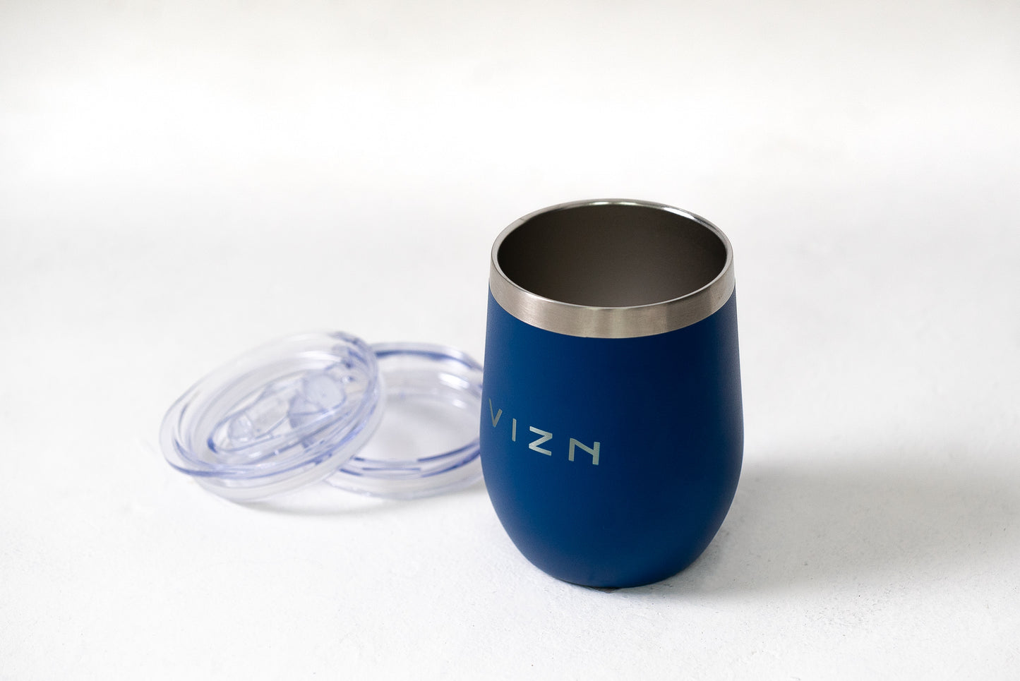 Deep Sea Blue Sipper Tumbler with a slide lid, emphasizing its minimalist design