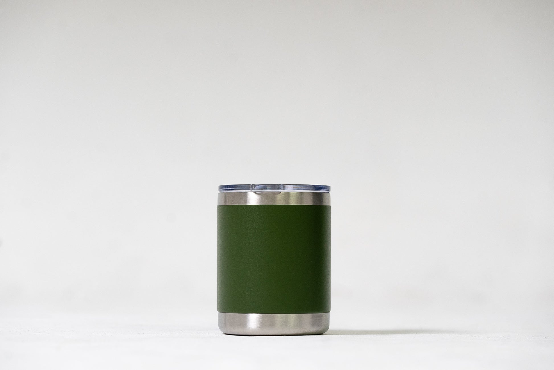 Khaki OG Tumbler on a table, showing its easy maintenance and elegant design