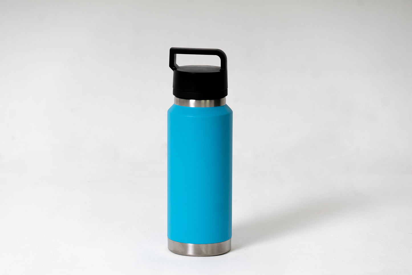 36oz vacuum insulated water bottle with spout lid and carry handle in sky blue