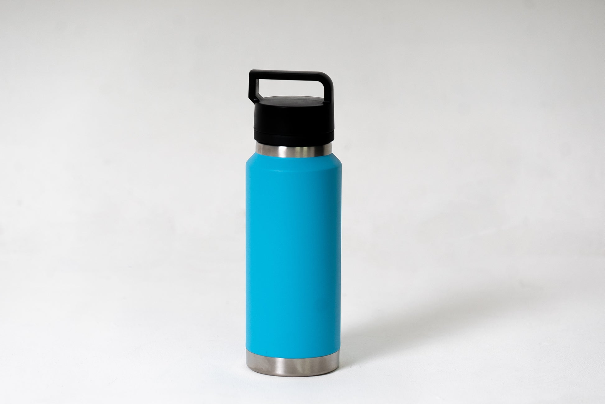 36oz vacuum insulated water bottle with spout lid and carry handle in sky blue