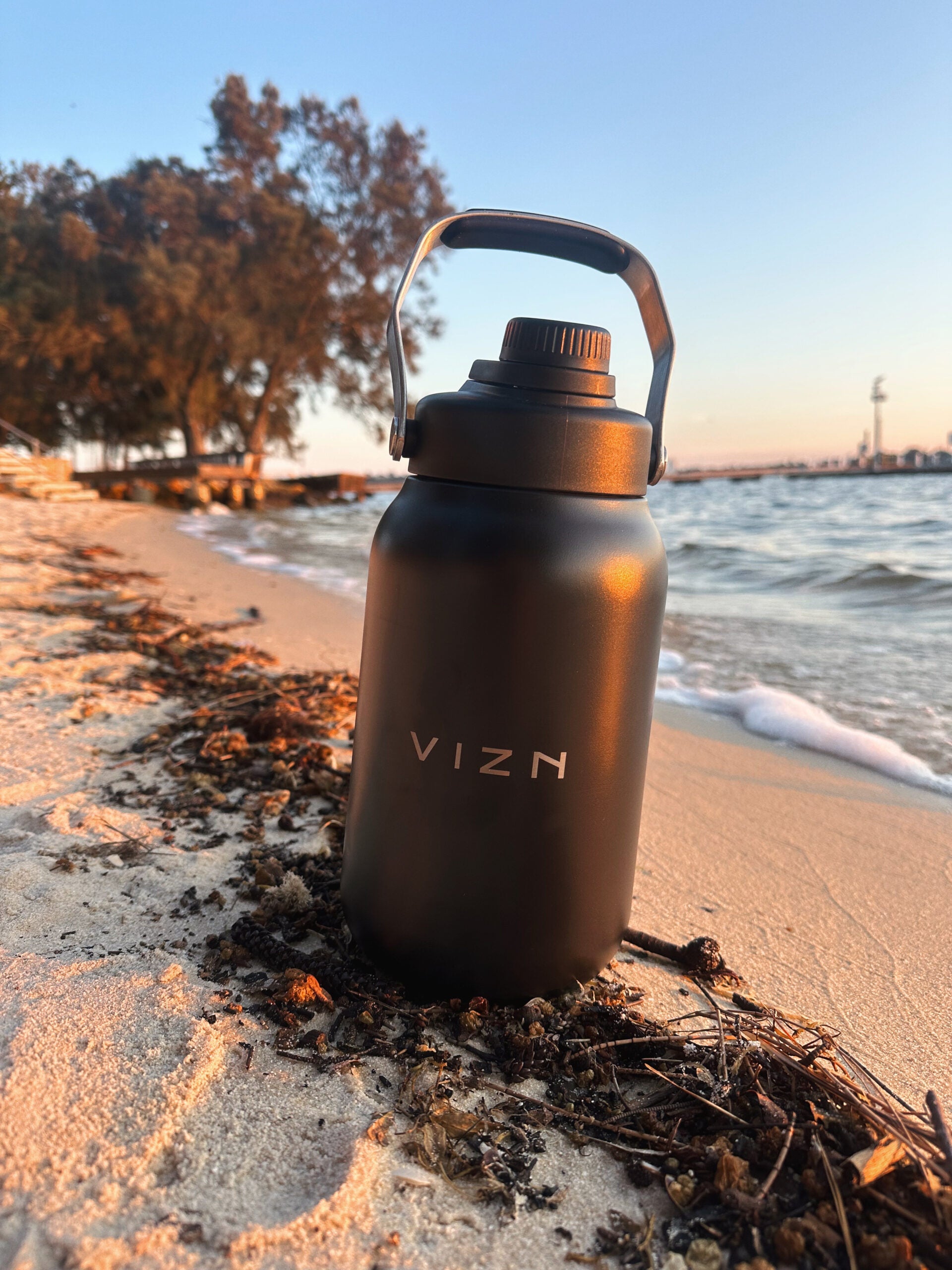 1.9L stainless steel water bottle with screw top lid and condensation-free design