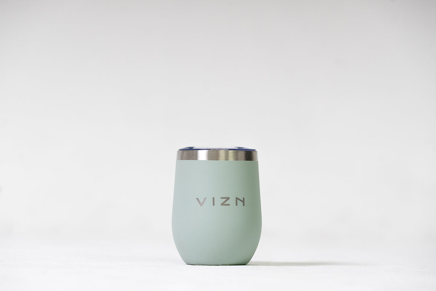 Sea Foam Green Sipper Tumbler with a close-up view of its sleek stainless steel finish.