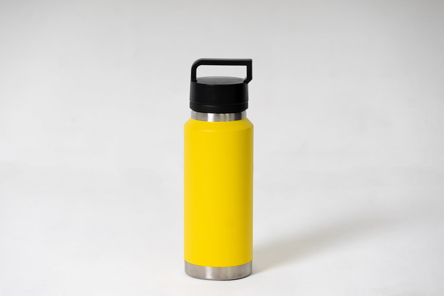 1 litre stainless steel water bottle with straw lid and carry handle in yellow