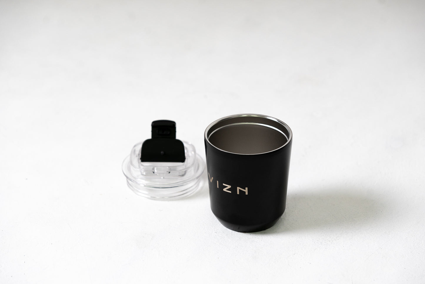 Stainless steel coffee cup in 280ml size fitting in a standard cup holder