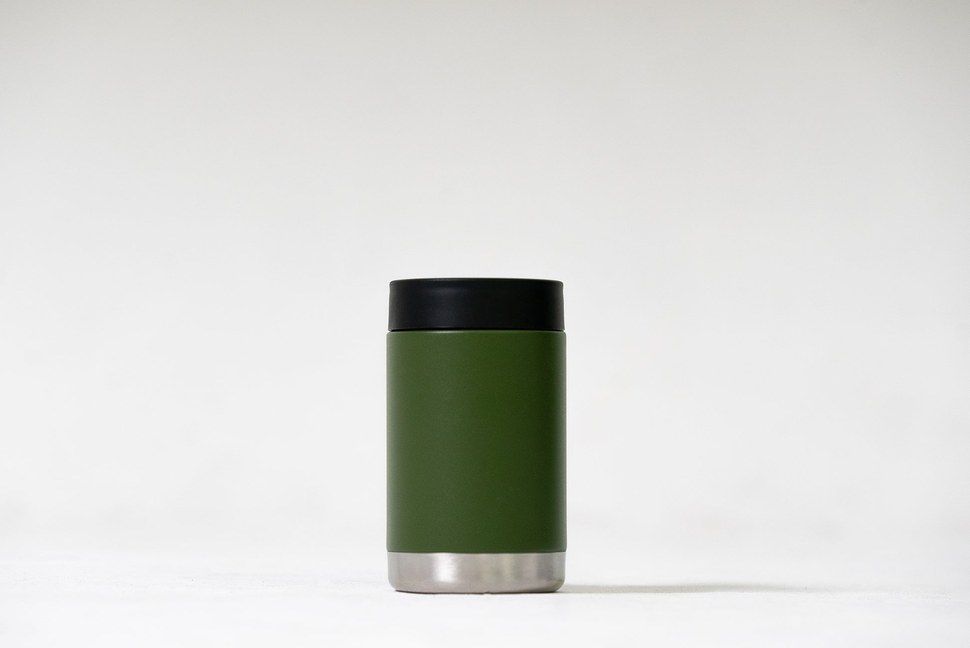 Stubby Buddy can cooler holding a stubby bottle with condensation-free exterior