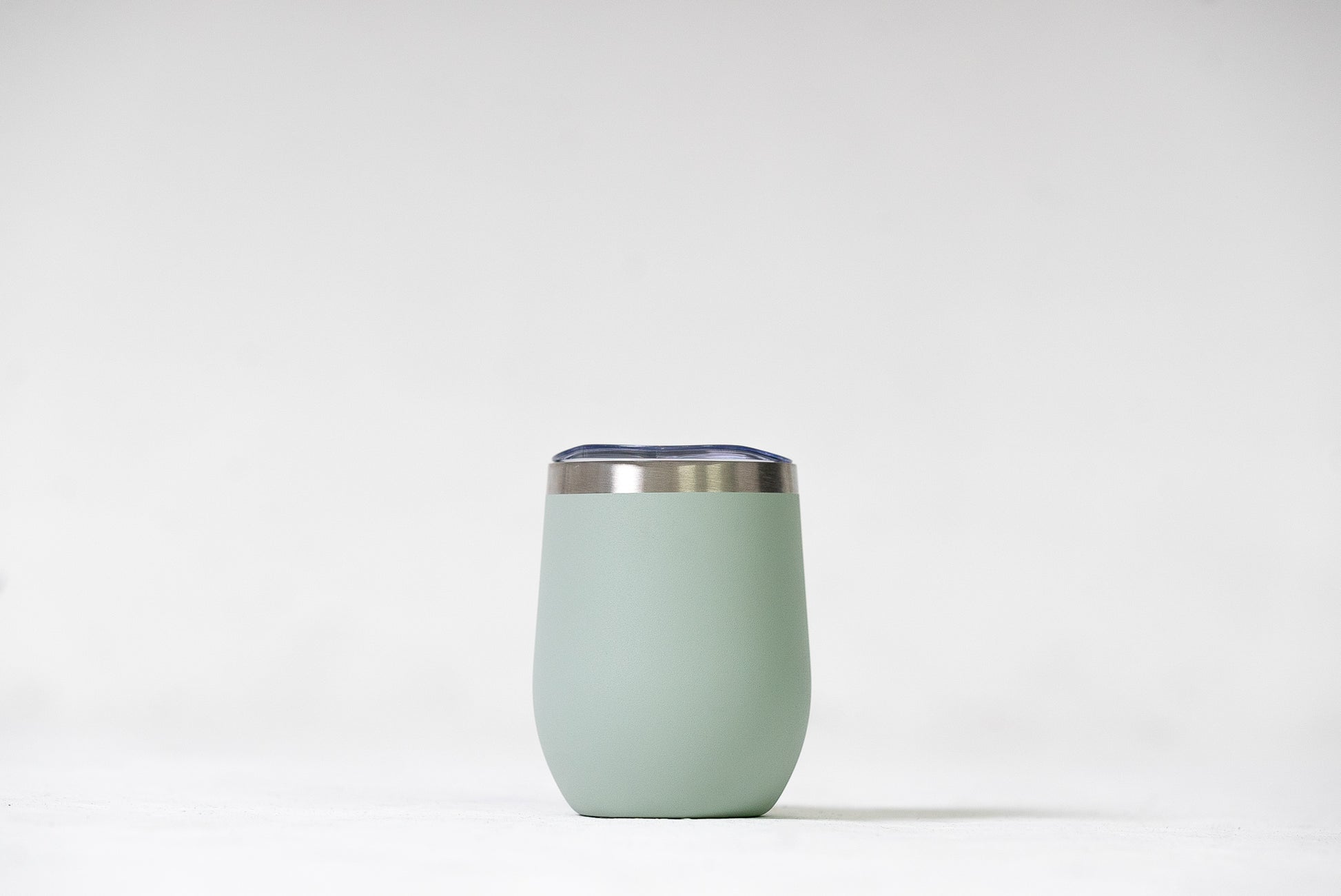 Sipper Tumbler with open spout lid and Seam Foam light green colour, ideal for easy sipping.