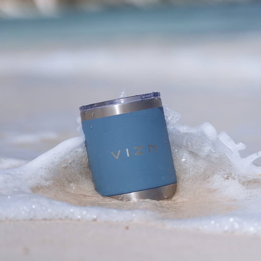 Light Mist Blue OG Tumbler highlighting its sleek, thermal insulation features.