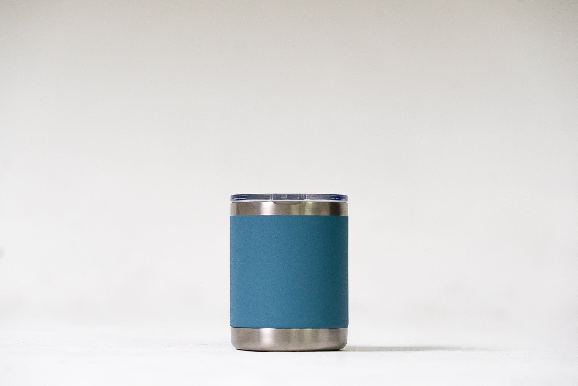 Mist Grey Blue OG Tumbler with a close-up of its durable, double-walled design