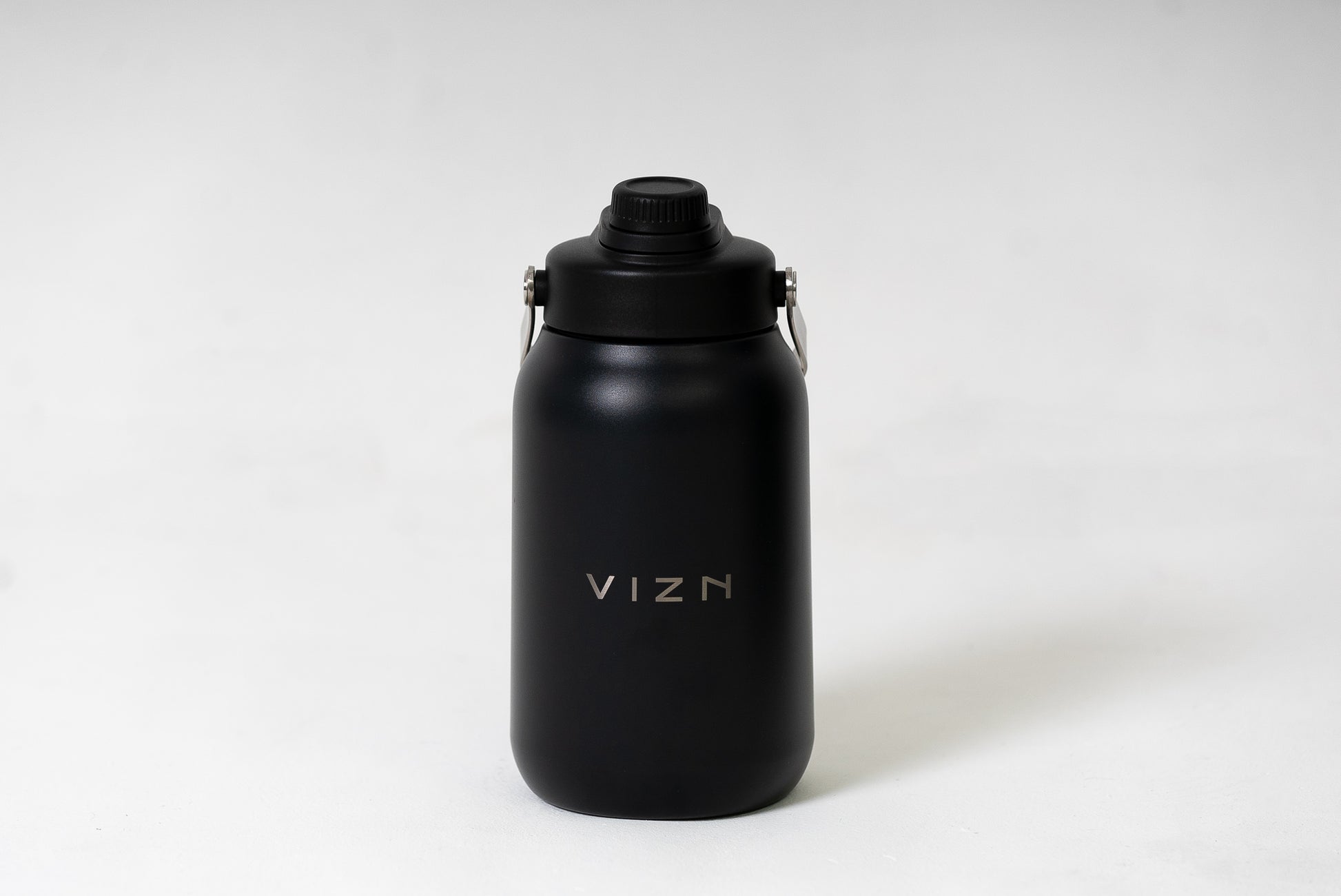 Growler water bottle with double-walled insulation and screw top lid